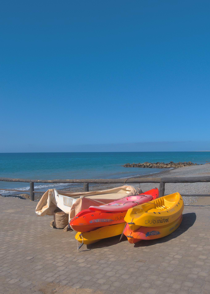 Canoes by the sea