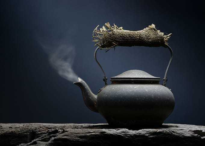 Vintage kettle with steam