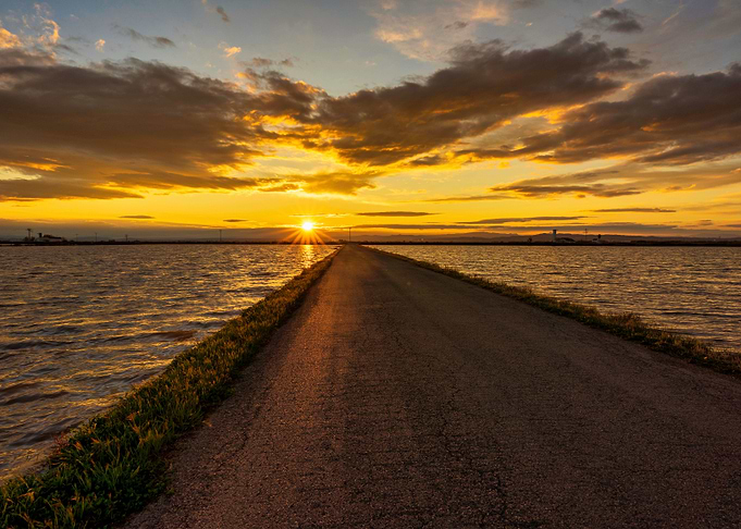 Sunset by the water