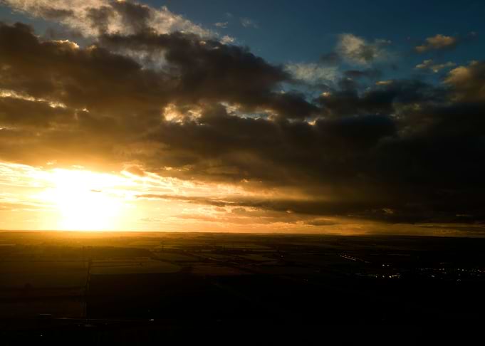Sunset over rural fields
