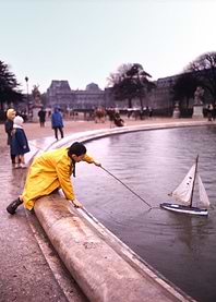 Young boy with his boat
