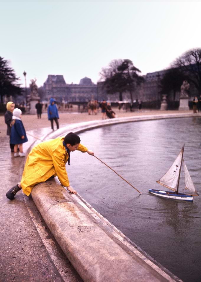 Young boy with his boat