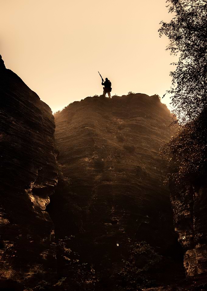 Soldier in the rocks