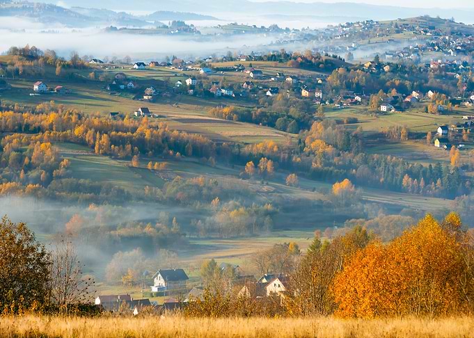 Autumn travel, misty hills