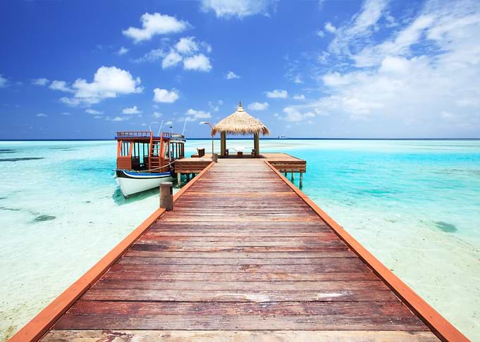 Pier on the beach Maldives