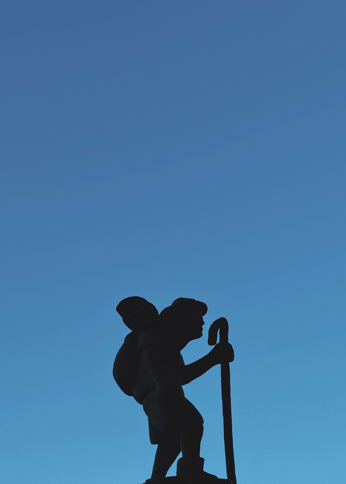 blue sky + camino pilgrim