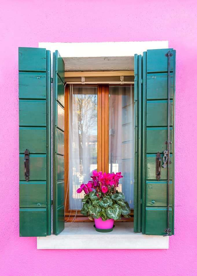 Window on pink house Italy