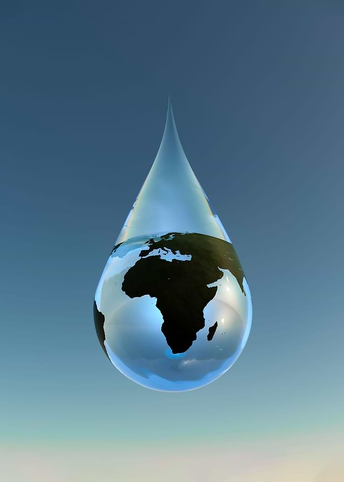 Earth inside water drop