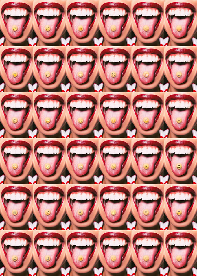 Drug pill smiley on tongue