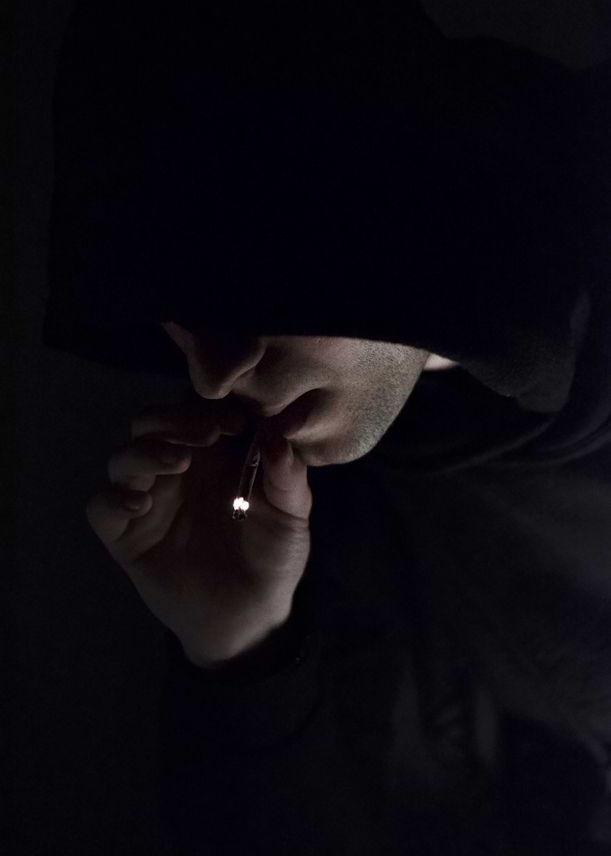 Smoking Man in a Hoodie