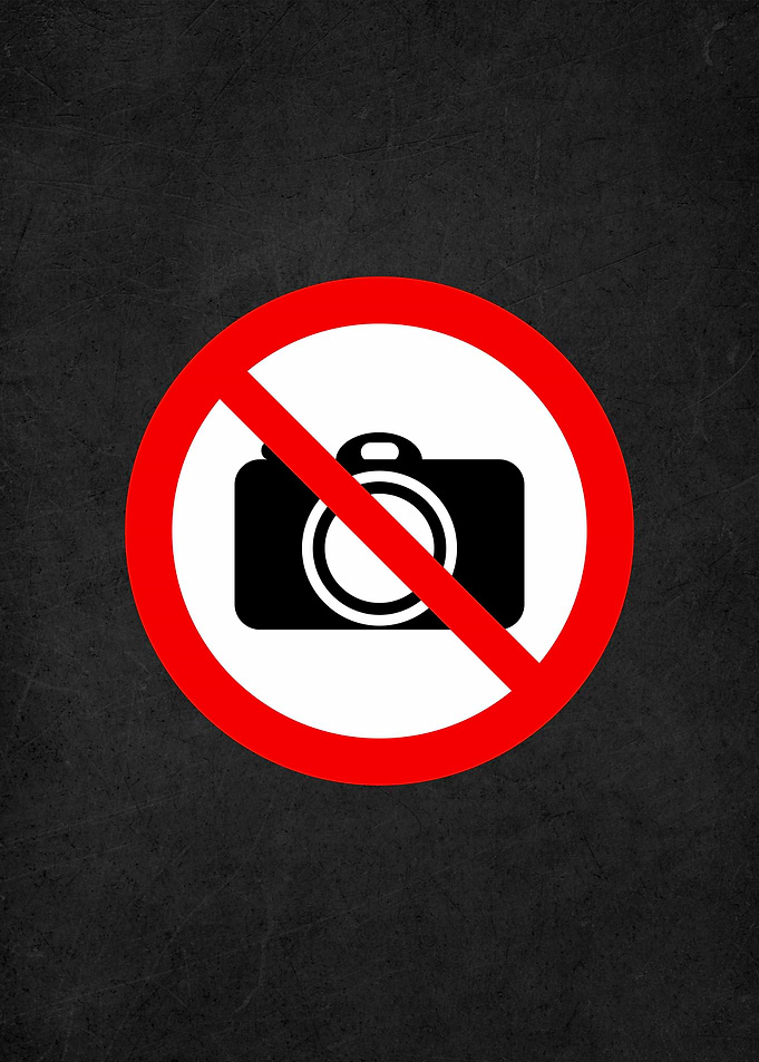 no cmaera warning sign
