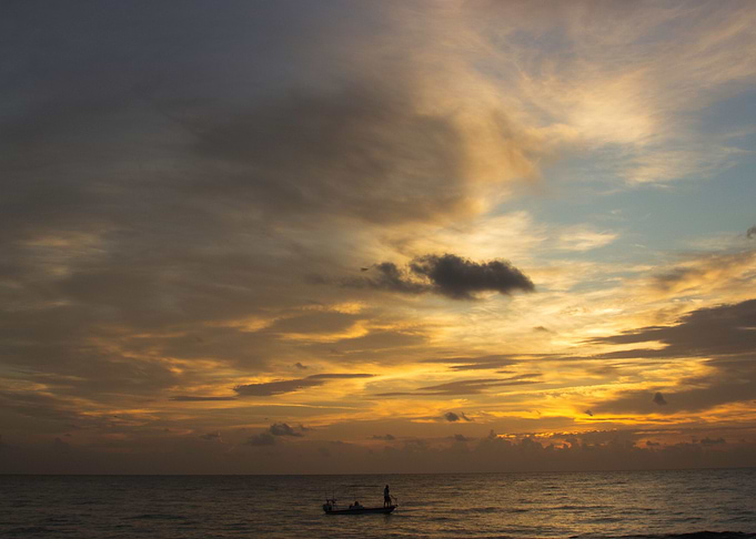 Fishing at sunrise