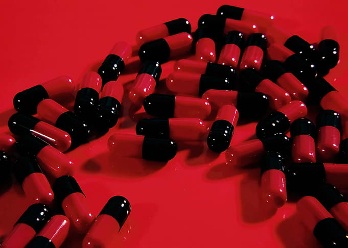 Pills mess chaos red black