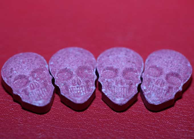 Pink skull ecstasy pill