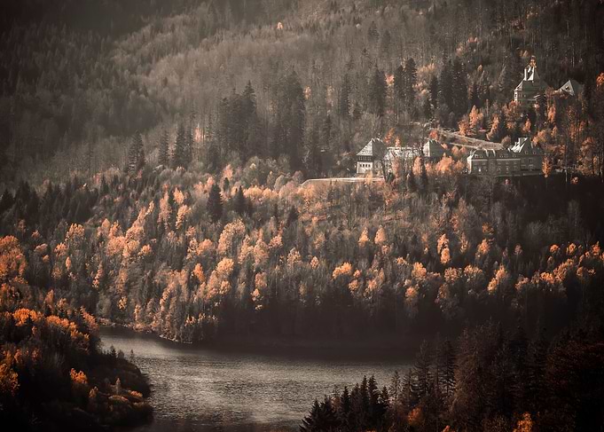 Autumn castle in mountains