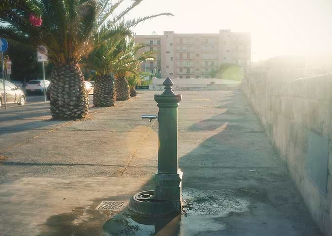Fountain sun flood noon