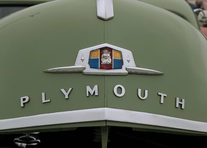 Vintage Plymouth Car Logo