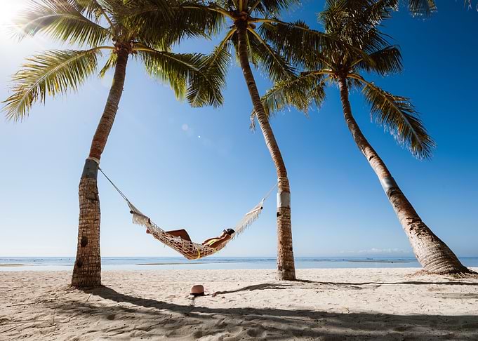 Woman on hammock at beach