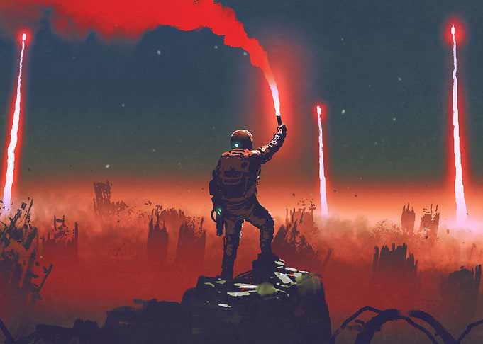 Man holds a red smoke