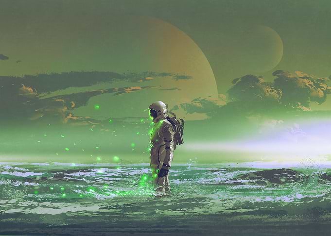astronaut standing on sea