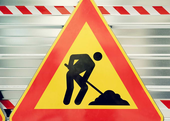 Street sign man at work co