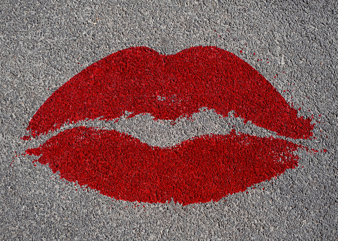 Lips print red asphalt ove