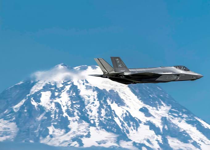 F35 over a mountain range