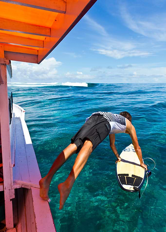 Indonesia Surfer Jumping