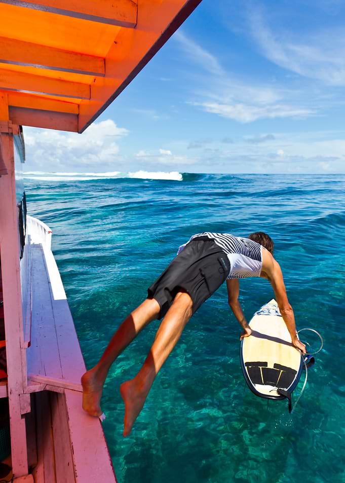 Indonesia Surfer Jumping