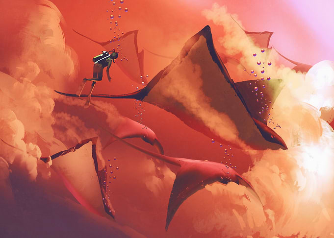 Diver and manta rays