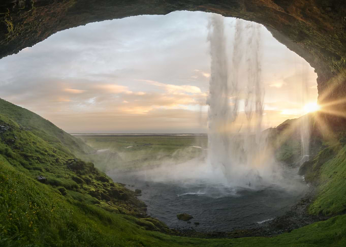 Waterfall over a cave