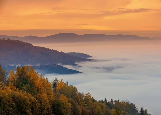 Autumn travel, misty hills