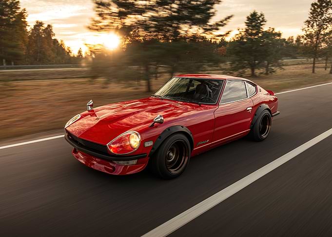 Red Datsun Fairlady Z sun