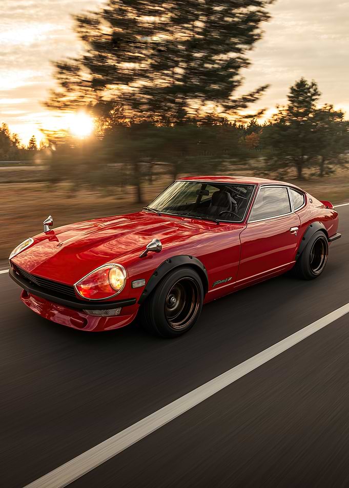 Red Datsun Fairlady Z sun