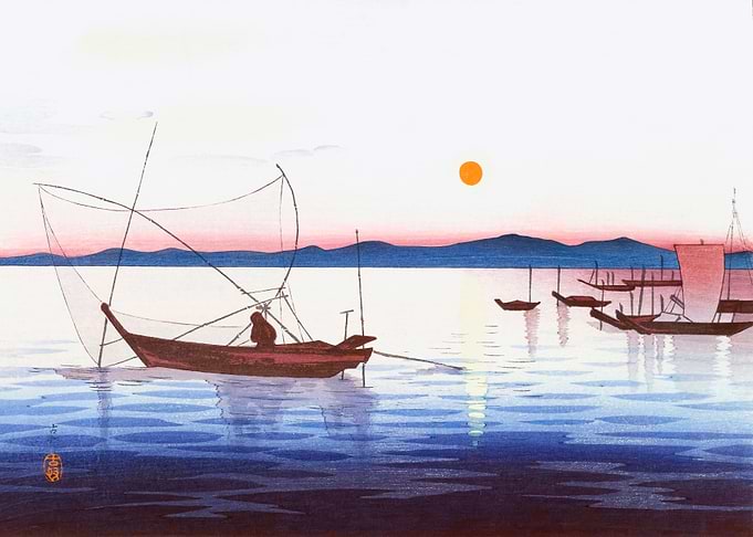 Boats in the setting sun