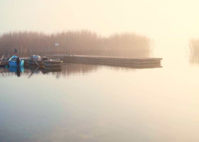 Autumn lake fishing pier