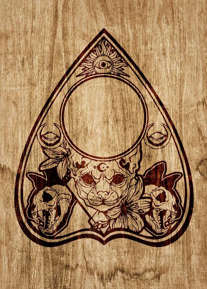 Ouija planchette cat
