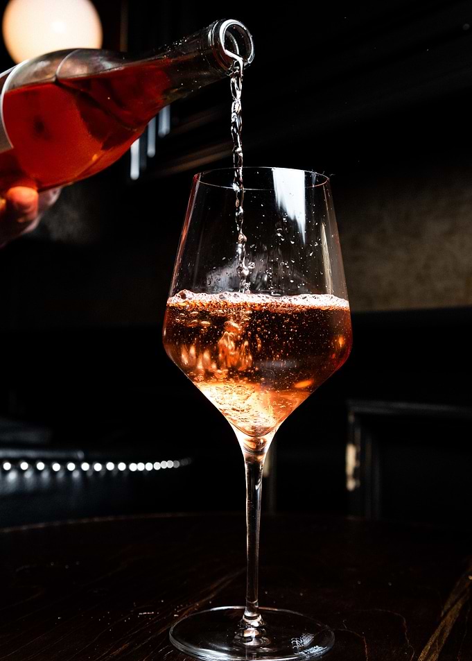Pouring a tot of liquor