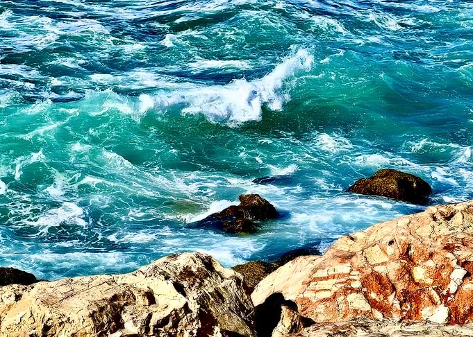 Turquoise Waves and Cliffs