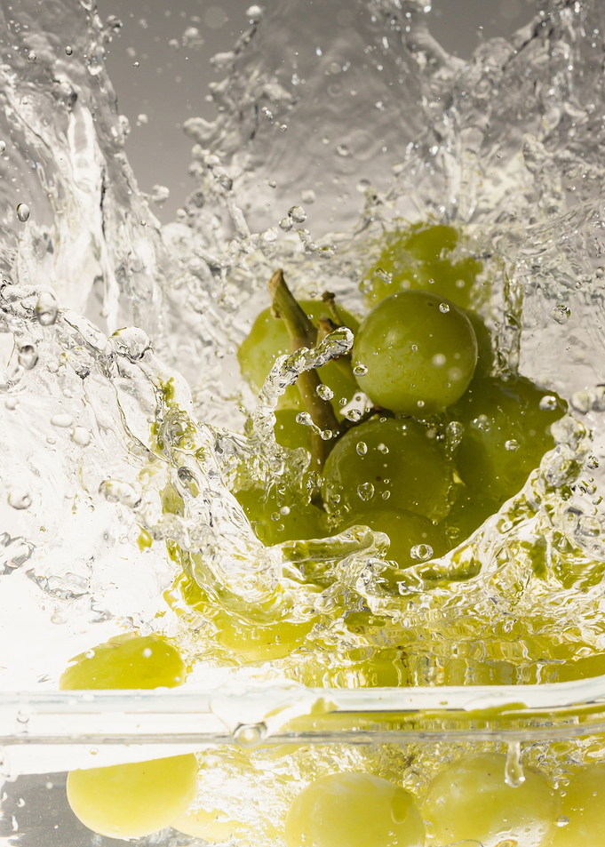 Grapes falling into water1
