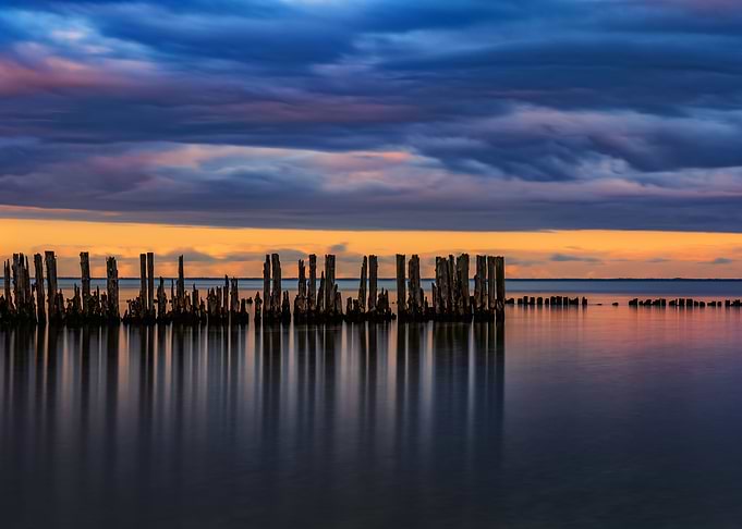 Old Pier And The Sea