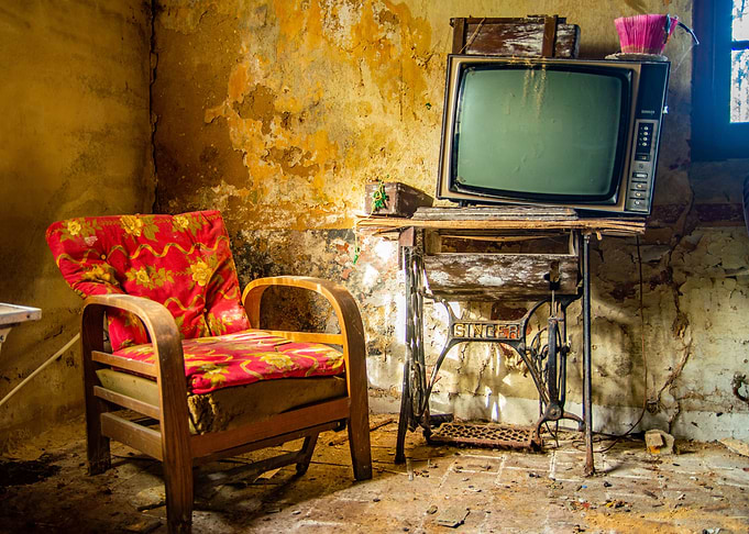 Red armchair television