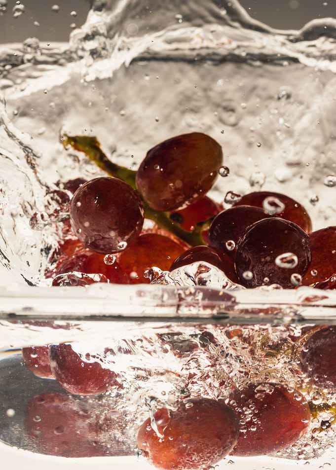 Red grapes splashing 2