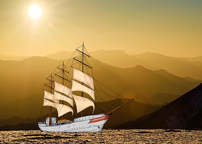 Sailboat in a golden bay