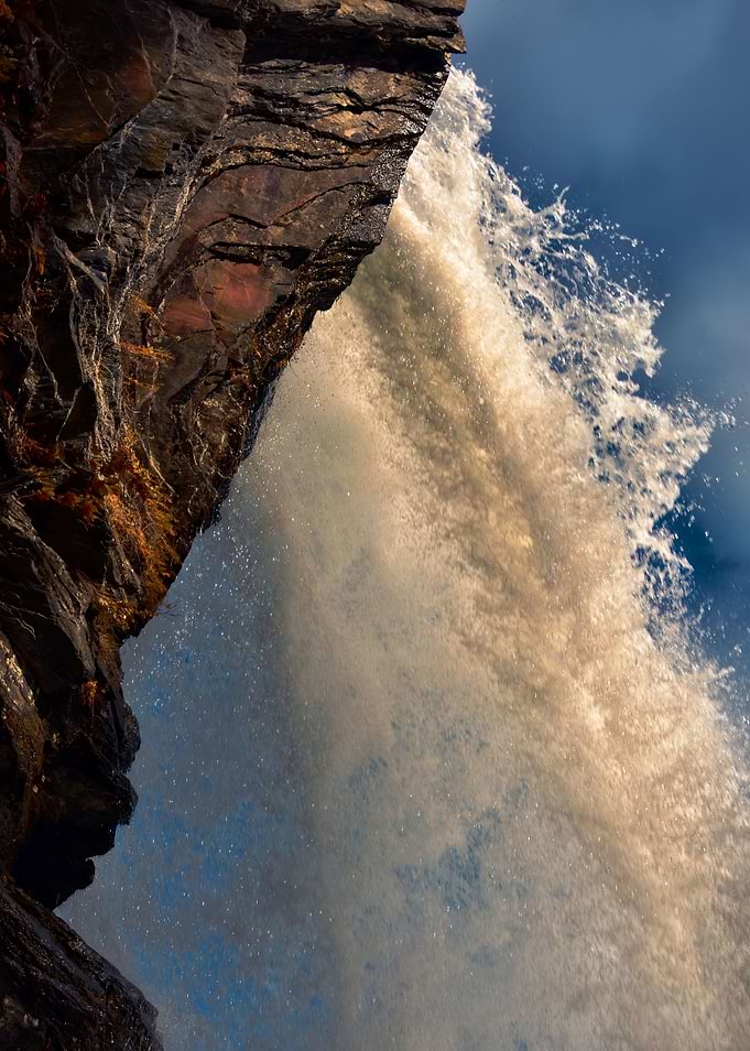 Underneath the waterfall