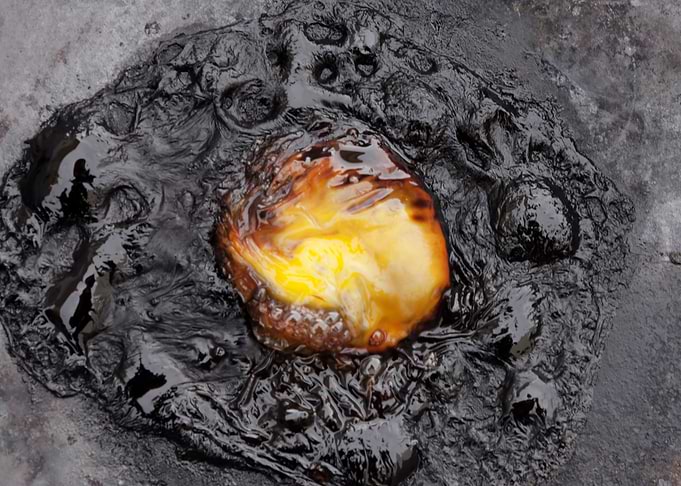 Egg burnt destroyed macro