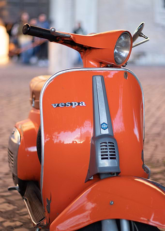 Orange Italian old vespa