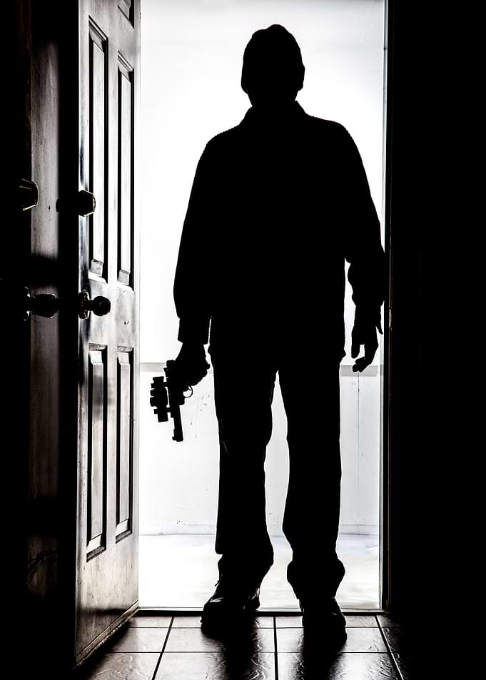 Intruder with Handgun