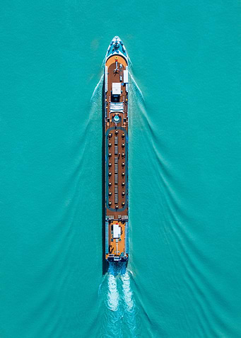 cyan water and boat