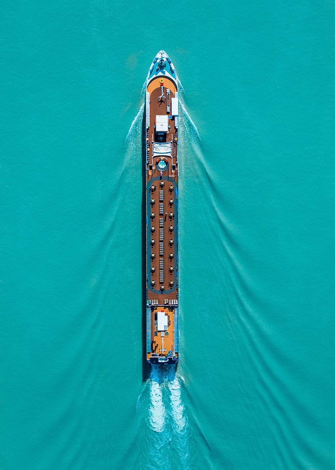 cyan water and boat